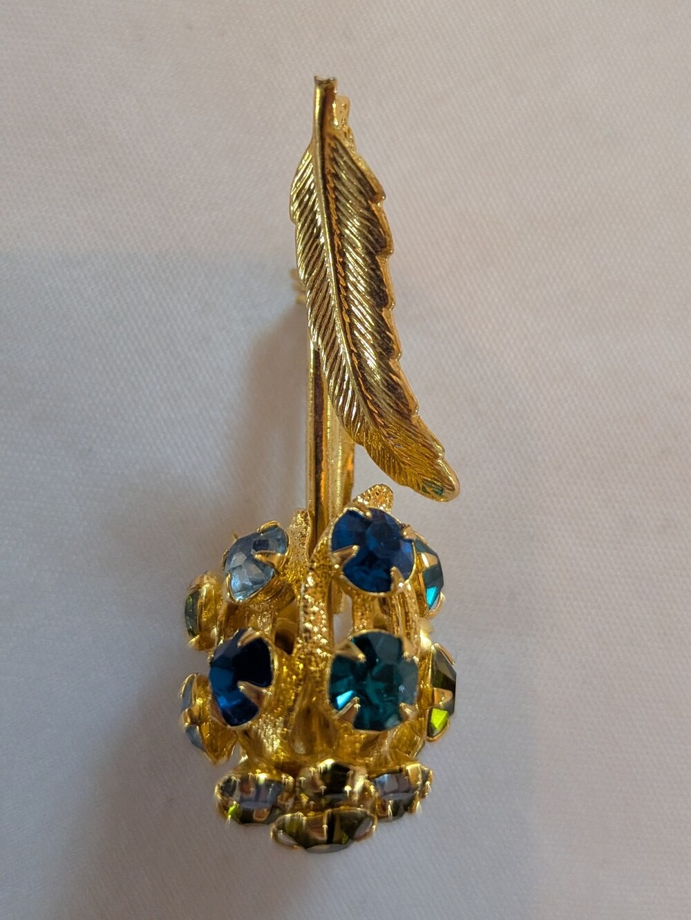 Vintage Gold-Tone Feather Brooch with Blue Crystal Accents